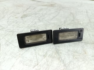 подсветка номера Audi A4 B8/8K 2009, 2.0 л., TDi, CAGC, дизель, 6МКПП, серебристый, универсал, передний привод, правый руль, 8T0943021