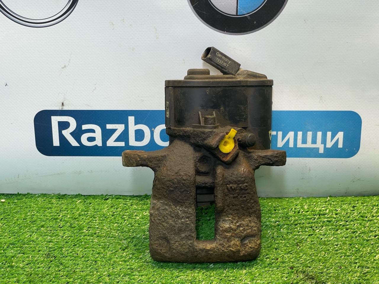 суппорт задний левый Volkswagen Passat B7 (2011 - 2015) - фото №1