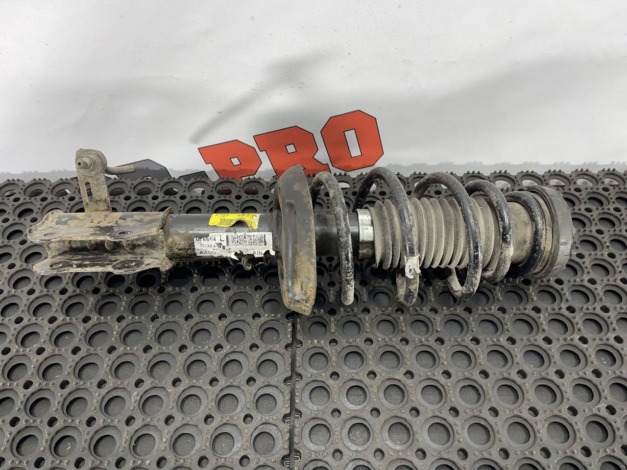 амортизатор передний левый Opel Astra J 2010, 1.2 л., дизель, МКПП, 13474015 - фото №1