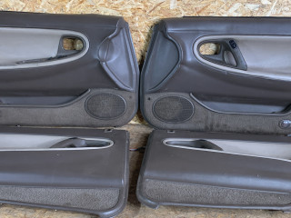 Обшивка двери (комплект) Mazda 626 GE [рестайлинг] 1995, 2.0 л., бензин, АКПП, седан