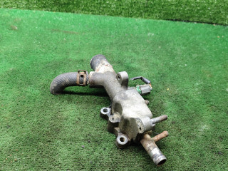 фланец (тройник) системы охлаждения Mazda 626 GE [рестайлинг] 1997, 1.8 л., бензин, МКПП, хетчбэк 5 дв.