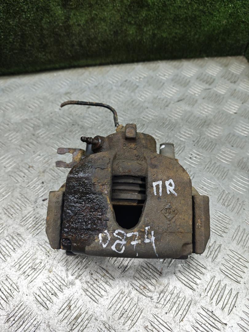 суппорт передний правый Renault Laguna 2 поколение 2002, 1.9 л., дизель, МКПП, хетчбэк 5 дв. - фото №1