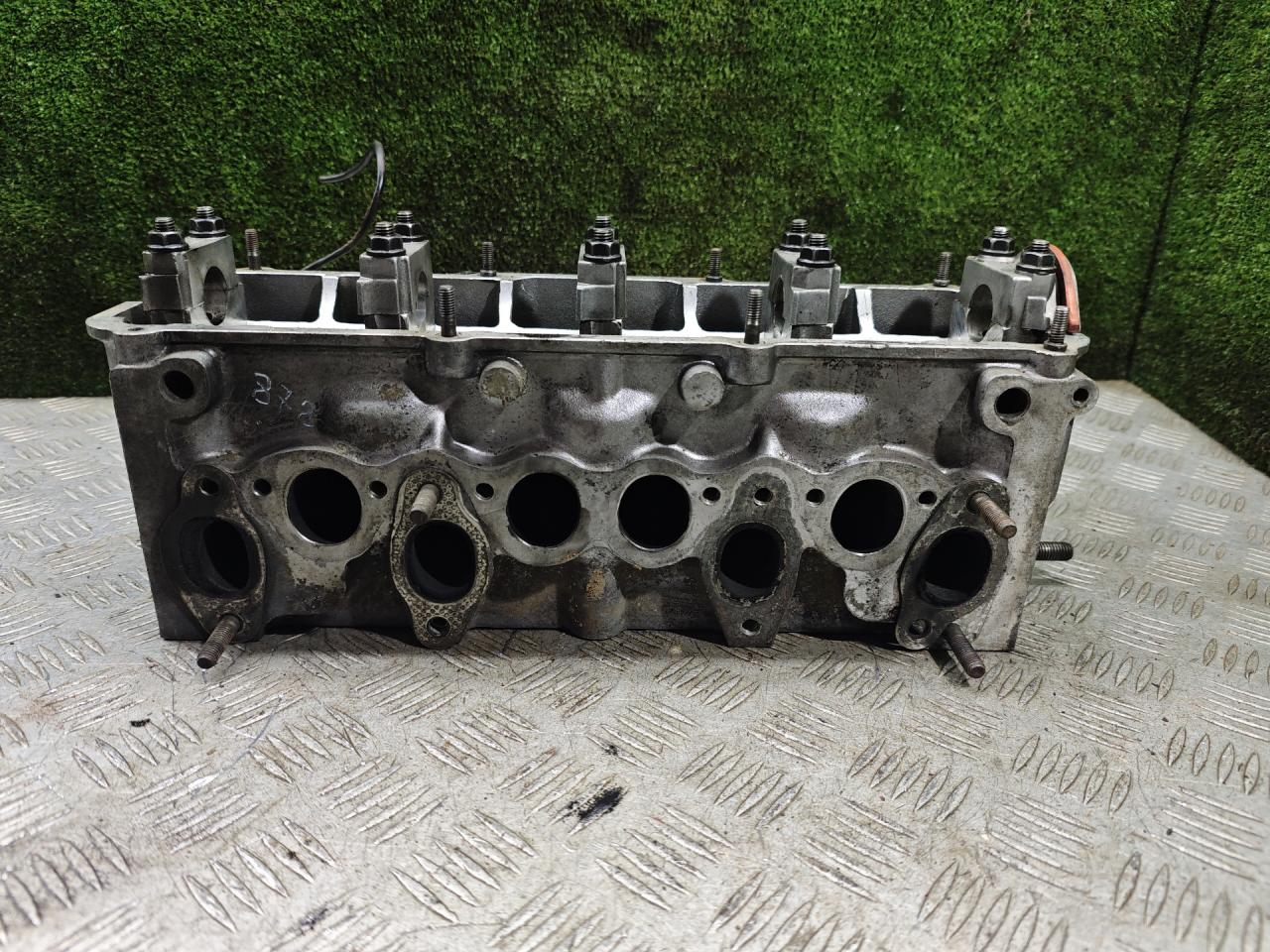 головка блока цилиндров Volkswagen Passat B2 1987, 1.9 л., дизель, МКПП, хетчбэк 5 дв. - фото №1
