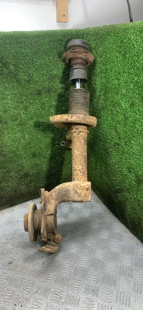 амортизатор передний левый Volkswagen Passat B2 1987, 1.9 л., дизель, МКПП, хетчбэк 5 дв. - фото №1