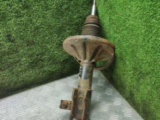 амортизатор передний левый Mazda 626 GE [рестайлинг] 1995, 2.0 л., бензин, АКПП, седан