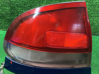 фонарь задний левый Mazda 626 GE [рестайлинг] 1997, 1.8 л., бензин, МКПП, хетчбэк 5 дв.