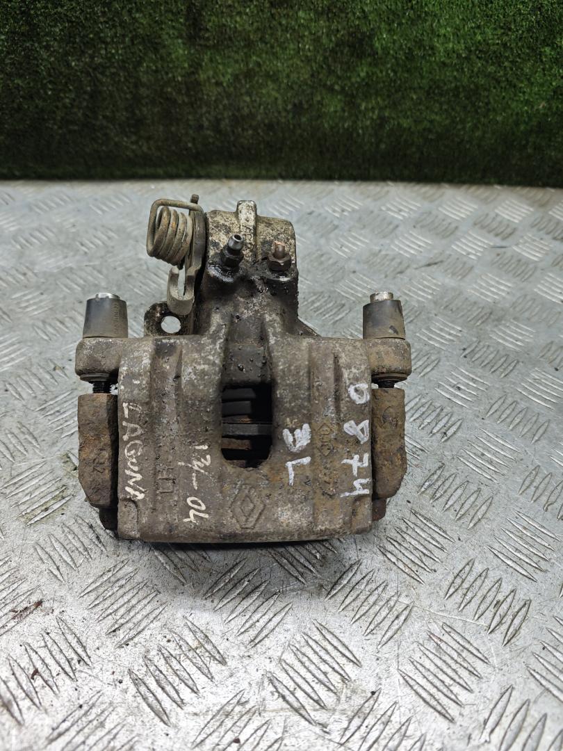 суппорт задний левый Renault Laguna 2 поколение 2002, 1.9 л., дизель, МКПП, хетчбэк 5 дв. - фото №1