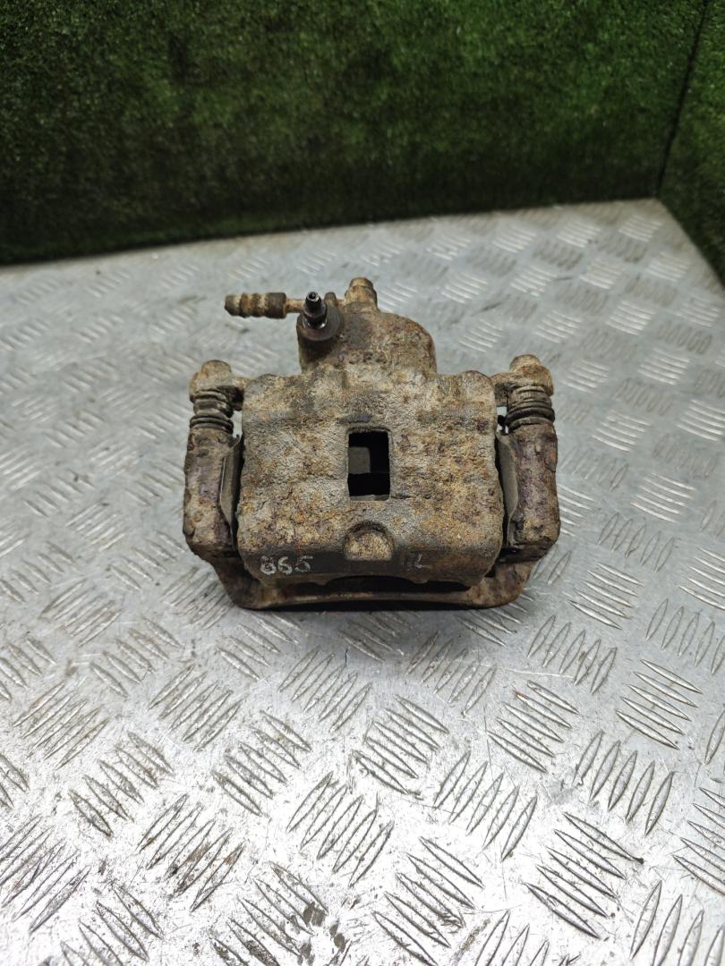 суппорт передний левый Hyundai Galloper 2 поколение 1998, 2.5 л., дизель, МКПП, внедорожник 5 дв. - фото №1