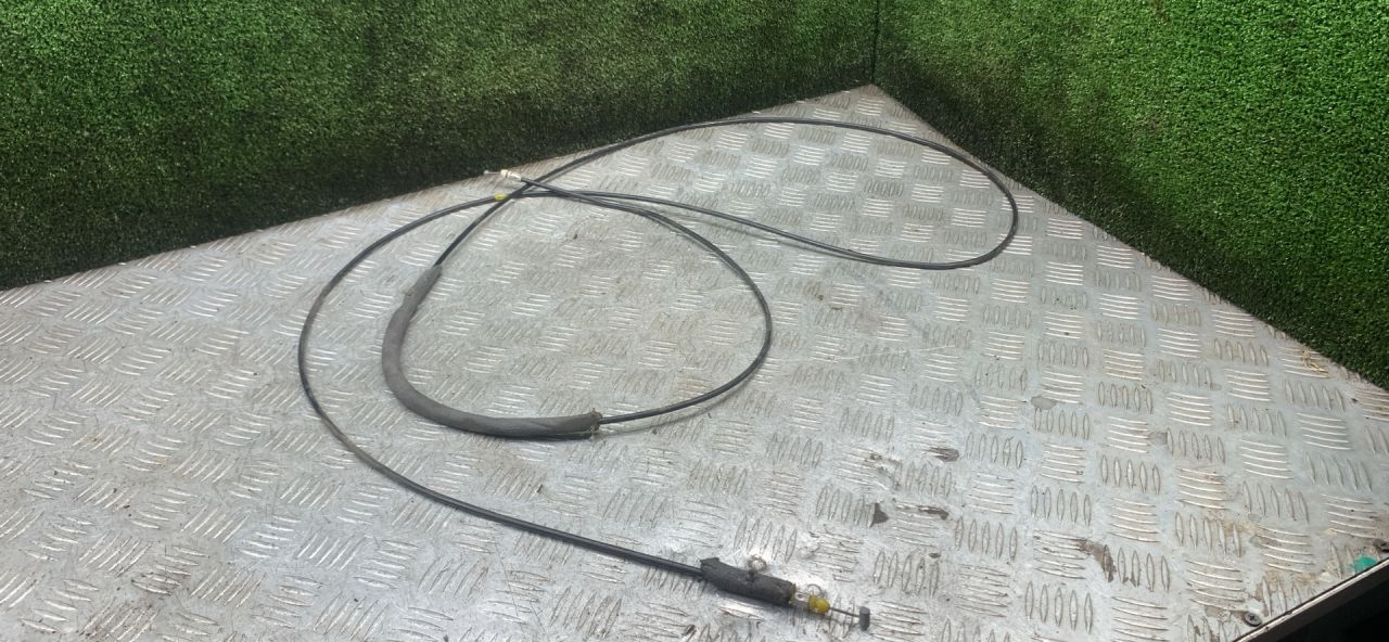 трос открывания багажника Hyundai Accent 1 поколение (X3) 1995, 1.5 л., бензин, МКПП, хетчбэк 3 дв. - фото №1