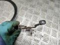 трос открывания лючка топливного бака Chevrolet Aveo T250 [рестайлинг] 2006, 1.4 л., F14D3, бензин, МКПП, седан - фото №2