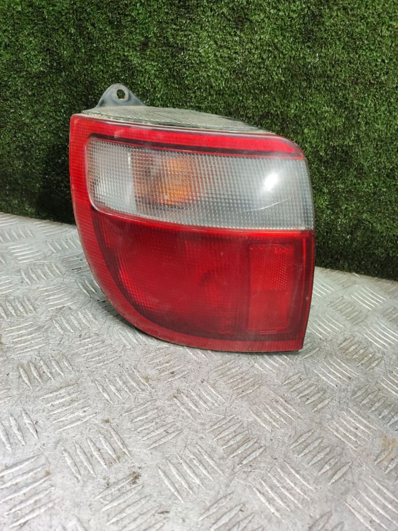 фонарь задний левый Toyota Carina E 1 поколение T190 1997, 2.0 л., 3S-FE, бензин, МКПП, универсал - фото №1