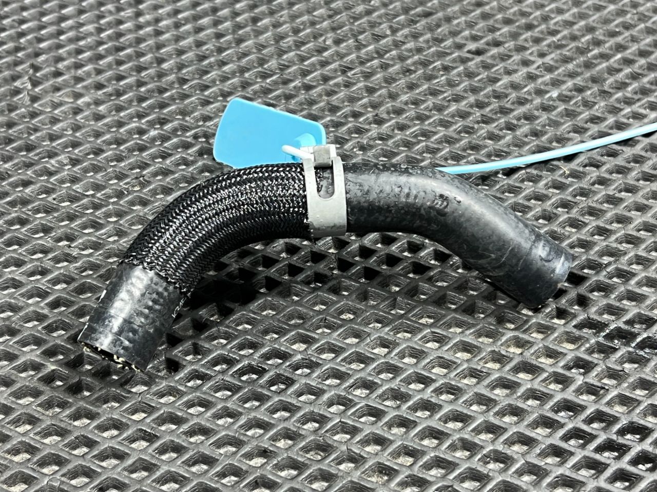 патрубок (трубопровод, шланг) Kia K5 3 поколение 2022, 1.6 л., G4FP, бензин, АКПП, седан, 284212M800 - фото №1