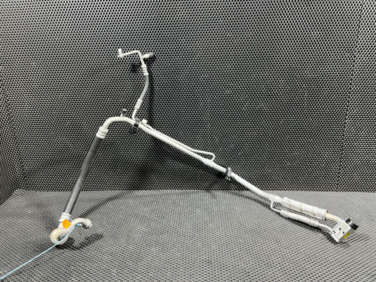 трубка кондиционера Kia K5 3 поколение 2022, 1.6 л., G4FP, бензин, АКПП, седан, 97777L3300 - фото №1