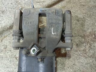 суппорт задний левый Volkswagen Passat B6 (2005 - 2010)