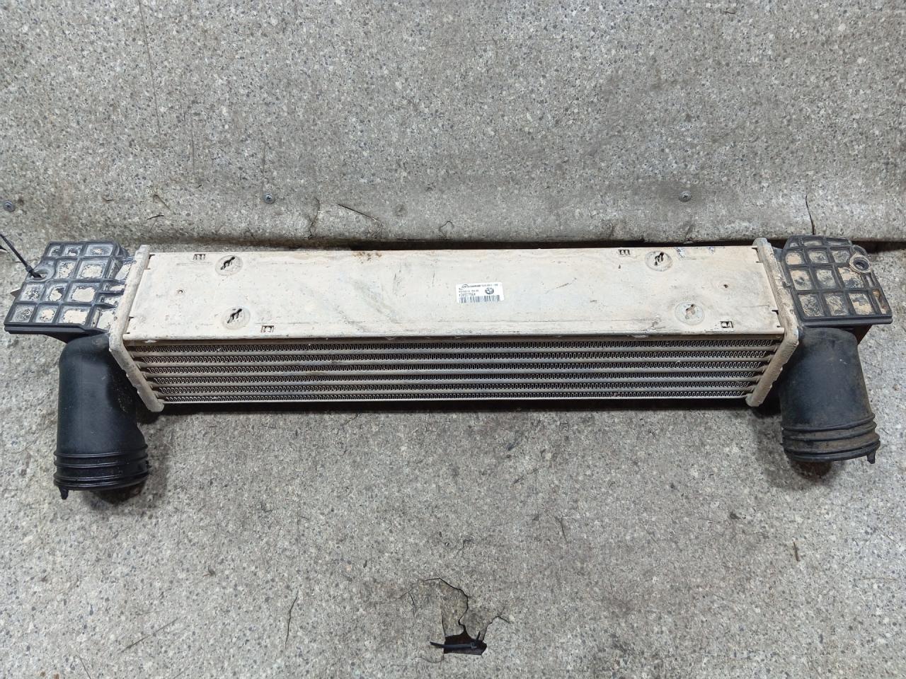 интеркулер BMW X1 E84 (2009 - 2012), 2.0 л., дизель, АКПП, задний привод, 17517524916 - фото №1