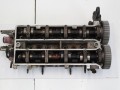 головка блока цилиндров Ford Fiesta 4 поколение AX 1998, 1.2 л., FSI, бензин, вариатор, черный, хетчбэк 5 дв., передний привод - фото №2
