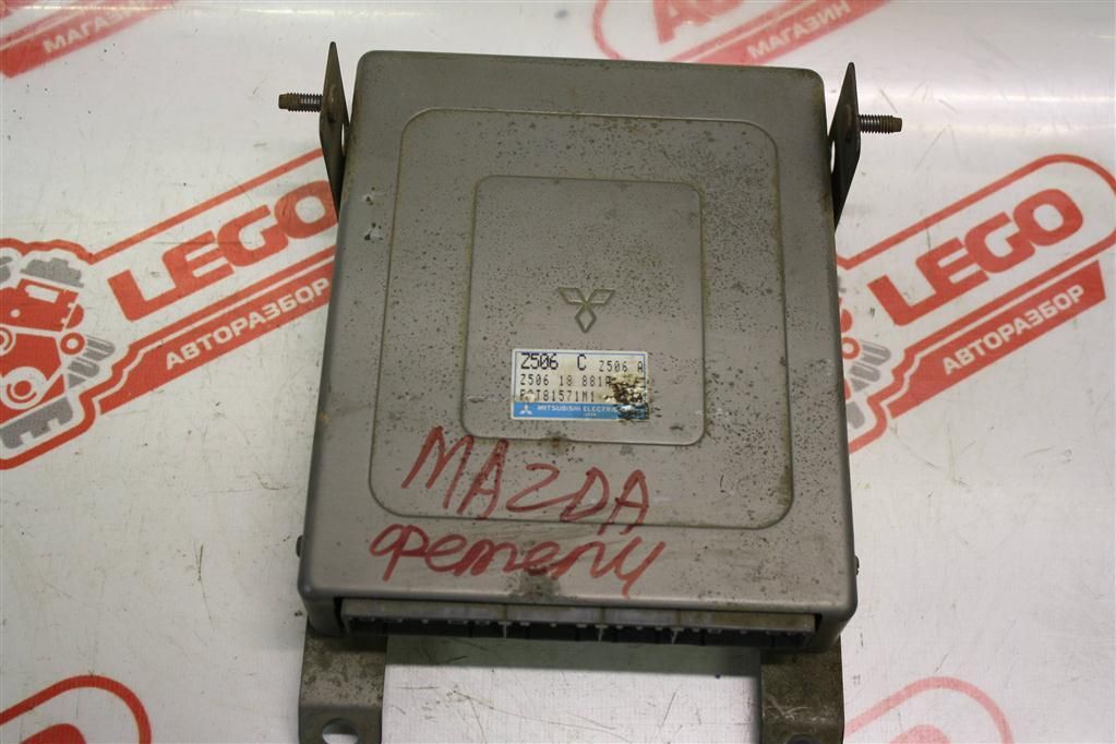 блок управления двигателем Mazda Familia 7 поколение BF3P 1994, 1.5 л., Z5, бензин, АКПП, серебристый, седан, передний привод, правый руль, Z50618881A - фото №1