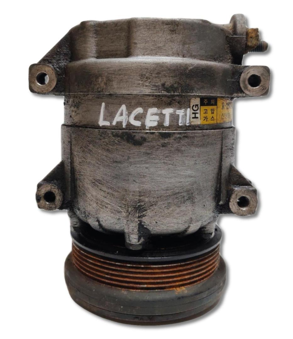 компрессор кондиционера Chevrolet Lacetti 1 поколение J200 2004, 1.6 л., F16D3, бензин, МКПП, серо-зеленый, хетчбэк 5 дв., передний привод, 715399 - фото №1