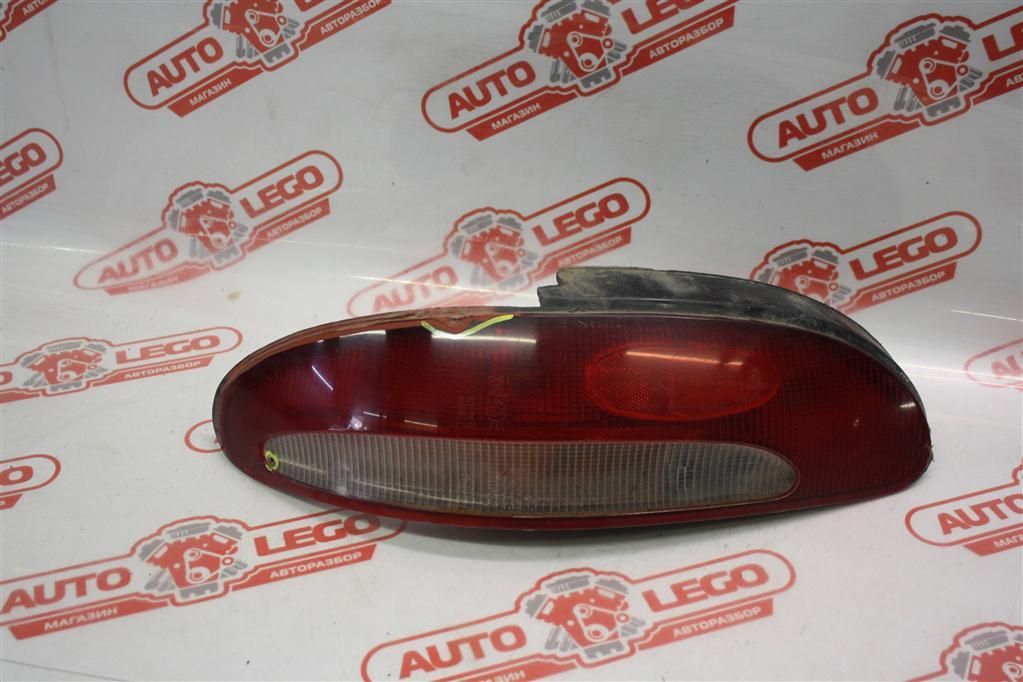 фонарь задний левый Mitsubishi Mirage 5 поколение C12A 1995, 1.3 л., 4G13 (12V), бензин, АКПП, серый, купе, передний привод, правый руль - фото №1