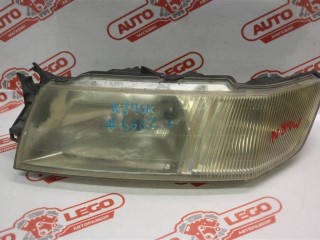 фара левая Mitsubishi Chariot 3 поколение 2000, MR566909