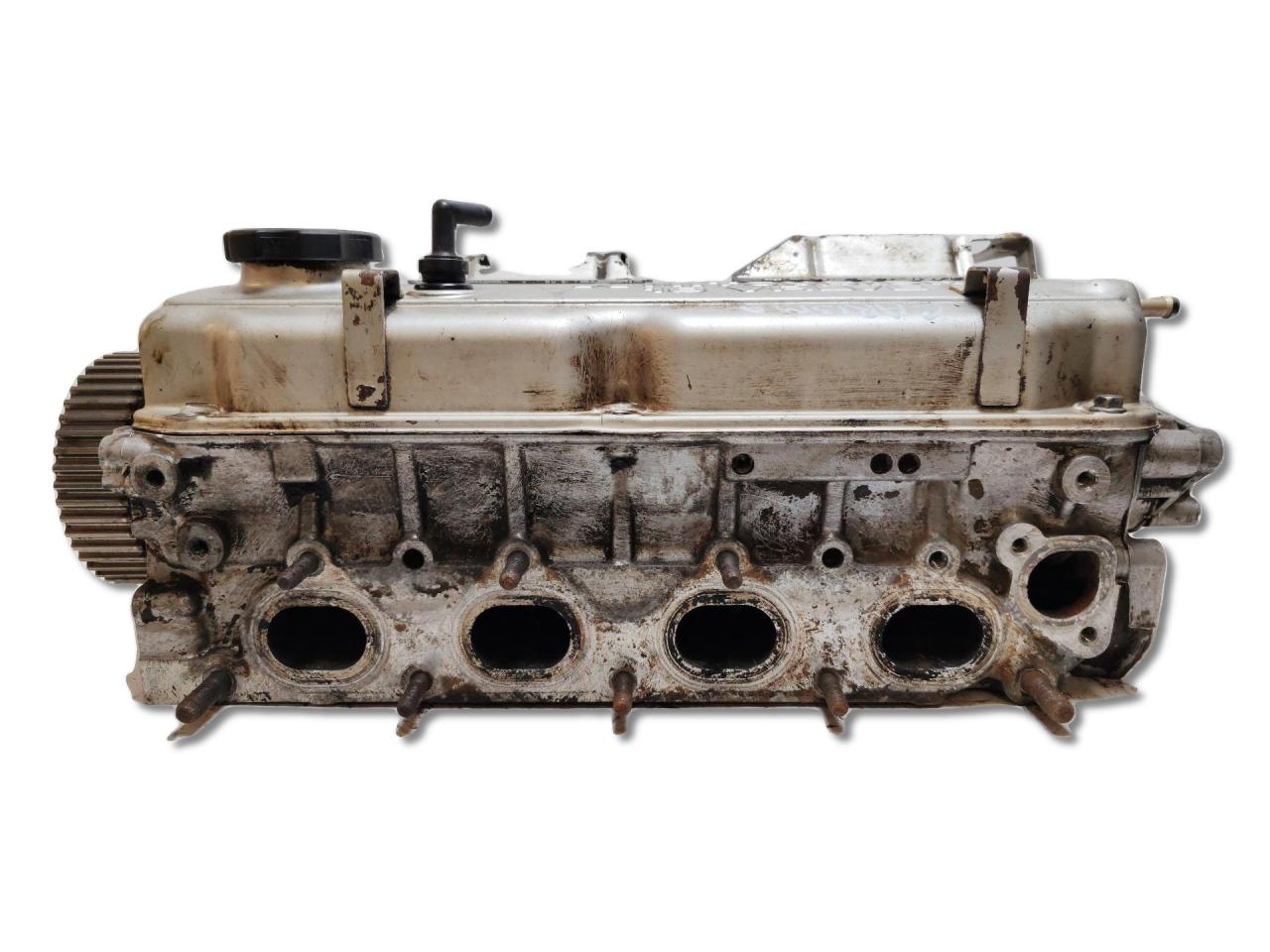 головка блока цилиндров Mitsubishi Carisma 1 поколение DA2A 1997, 1.8 л., бензин, АКПП, зеленый, лифтбэк, передний привод, MD313416 - фото №1