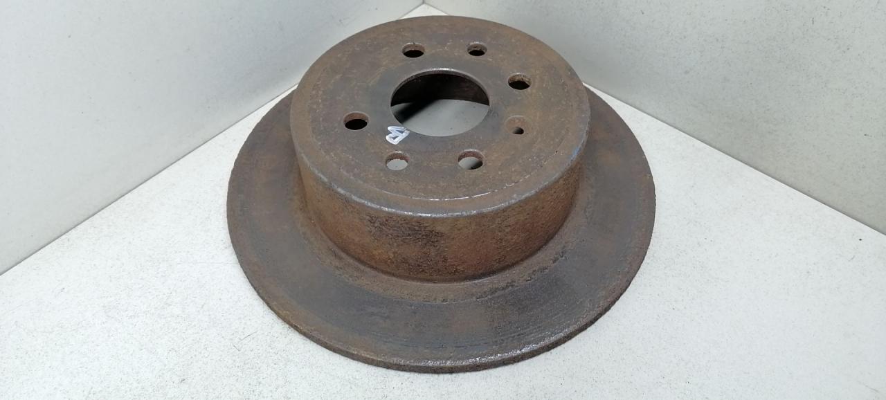 диск тормозной задний Opel Vectra B 1998, 1.6 л., X 16 XEL, бензин, 5МКПП, зеленый, универсал - фото №1