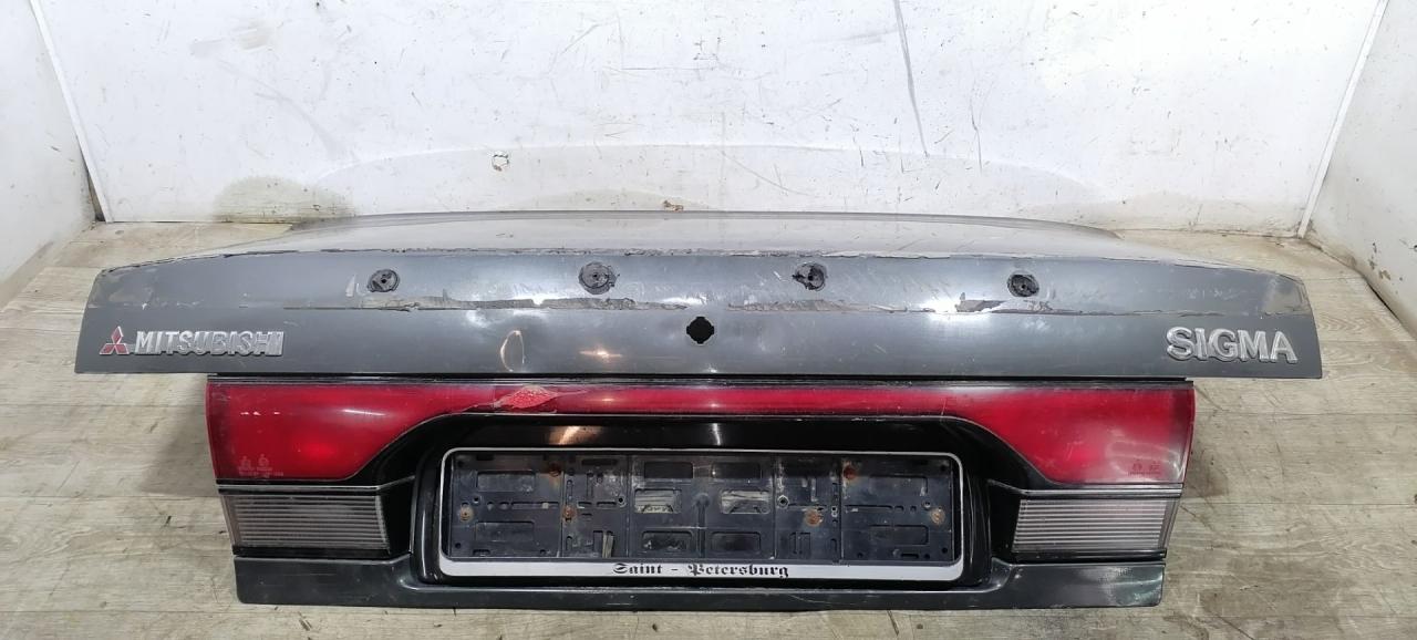 крышка багажника (дверь 3-5) Mitsubishi Sigma 1 поколение 1994, 3.0 л., i, 6G72 (DOHC 24V), бензин, 5МКПП, серый металлик, передний привод, 6M2A-R21812-AA, 924023000 - фото №1