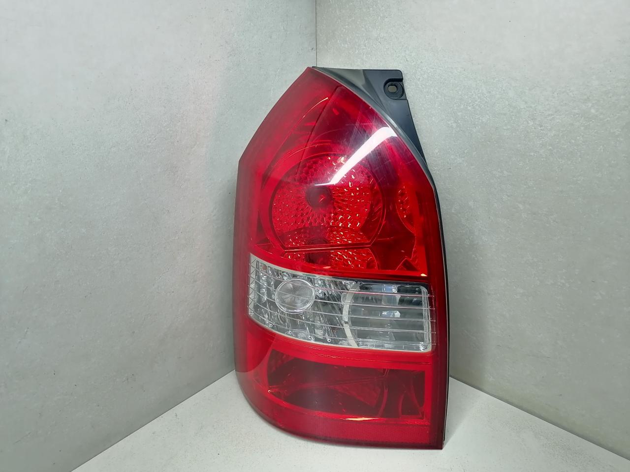 фонарь задний левый Hyundai Tucson 1 поколение 2006, 2.0 л., CRDi, дизель, АКПП, чёрный, внедорожник 5 дв., передний привод, 924012E010 - фото №1