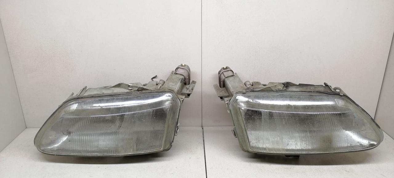 фара левая Renault Laguna 1 поколение 1997, хетчбэк 5 дв. - фото №1