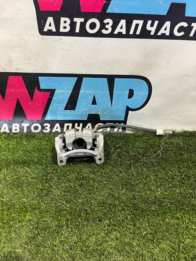 суппорт задний левый Buick Encore GX 1 поколение 2021, 1.3 л., бензин, АКПП, внедорожник 5 дв., передний привод, 42392214 - фото №1