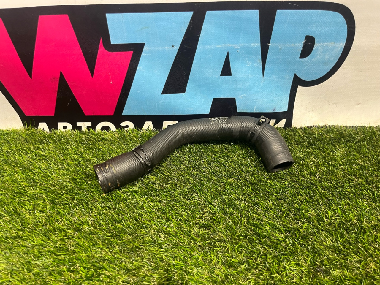 патрубок радиатора Fiat 124 2018, 1.4 л., бензин, МКПП, серы, родстер, задний привод - фото №1