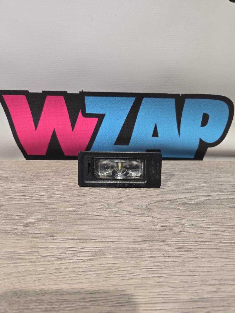 подсветка номера Volkswagen Jetta 7 поколение 2019, 1.4 л., бензин, МКПП, черный, седан, передний привод, 5NA943021 - фото №1