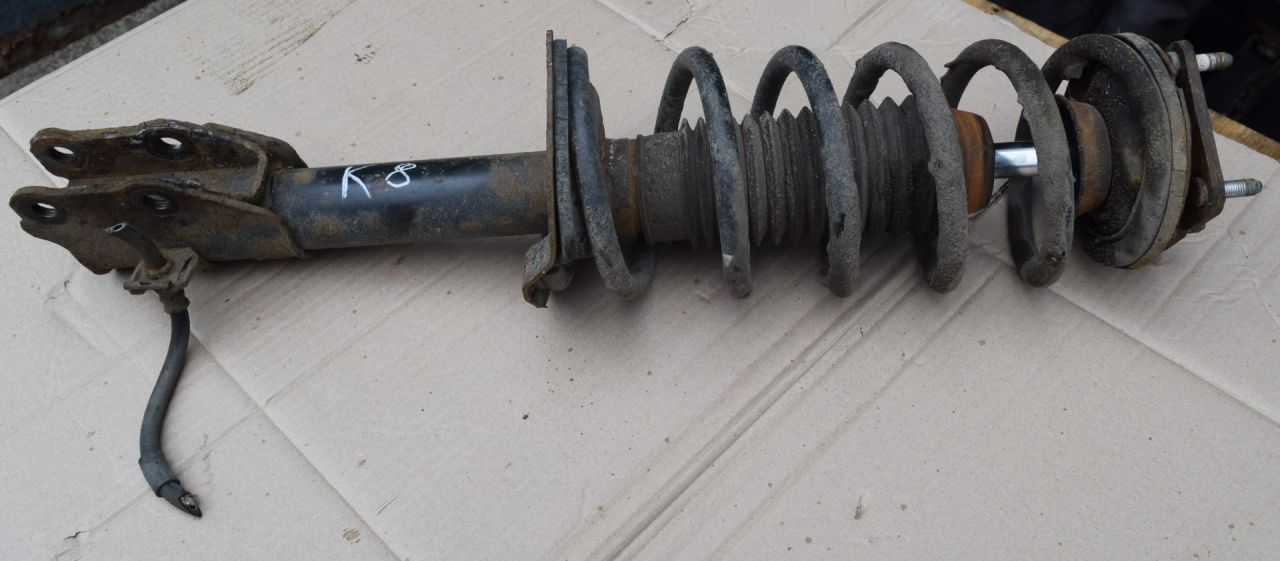 амортизатор передний правый Mazda CX-7 1 поколение 2007, 2.4 л., Ti, бензин, АКПП, передний привод, EG2334700 - фото №1