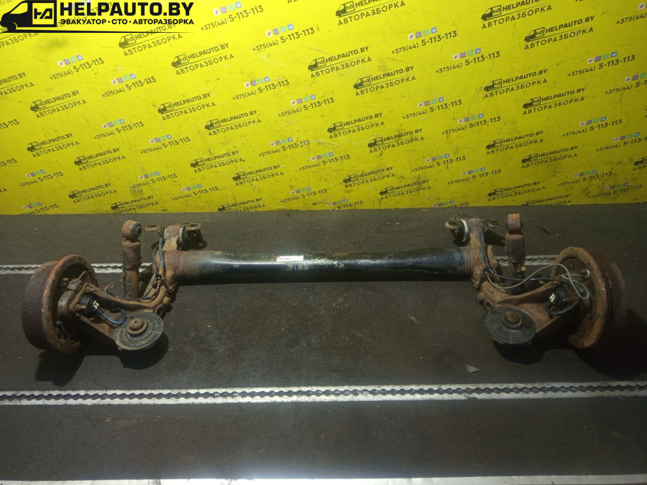балка подвески задняя Opel Astra G 1998, 1.4 л., X 14 XE, бензин, МКПП, серебро, универсал, передний привод - фото №1
