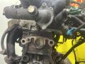 корпус термостата Toyota Carina E 1 поколение T190 1995, 1.6 л., 4A-FE, бензин, МКПП, зелёный, хетчбэк 5 дв., передний привод - фото №3