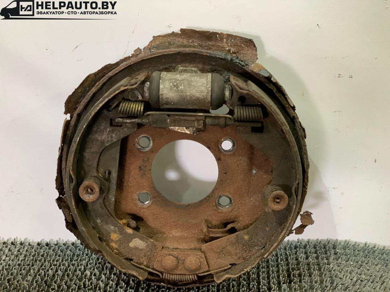 механизм развода задних тормозных колодок Nissan Bluebird T12/T72 1987, 2.0 л., бензин, МКПП, бордовый, хетчбэк 5 дв., передний привод - фото №1