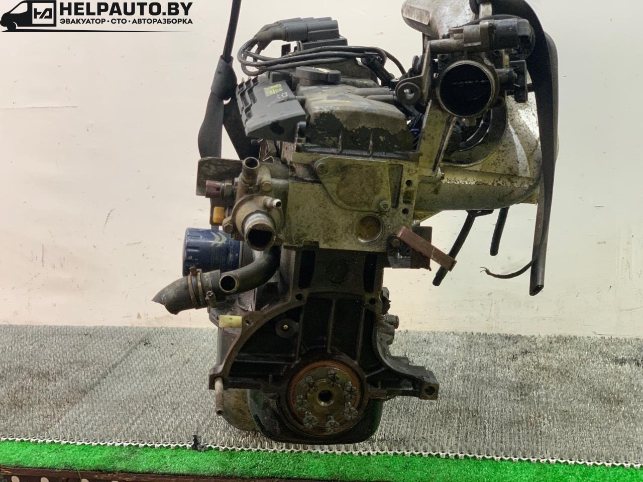 заслонка дроссельная Renault Scenic 1 поколение 1998, 1.6 л., бензин, МКПП, синий, передний привод - фото №1