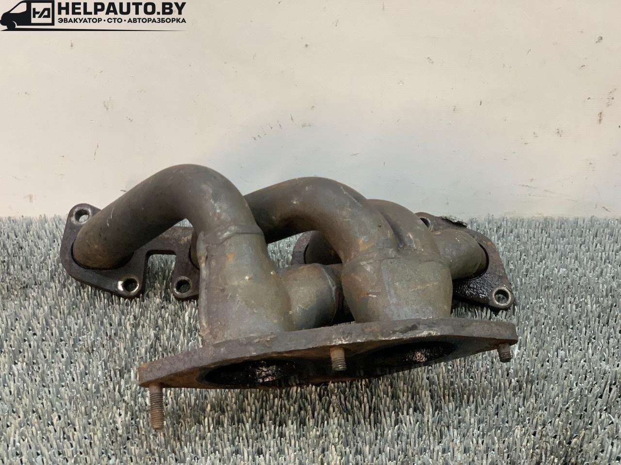 коллектор выпускной Fiat Punto 2 поколение 2002, 1.8 л., 188 A6.000, бензин, МКПП, серый, хетчбэк 3 дв., передний привод - фото №1