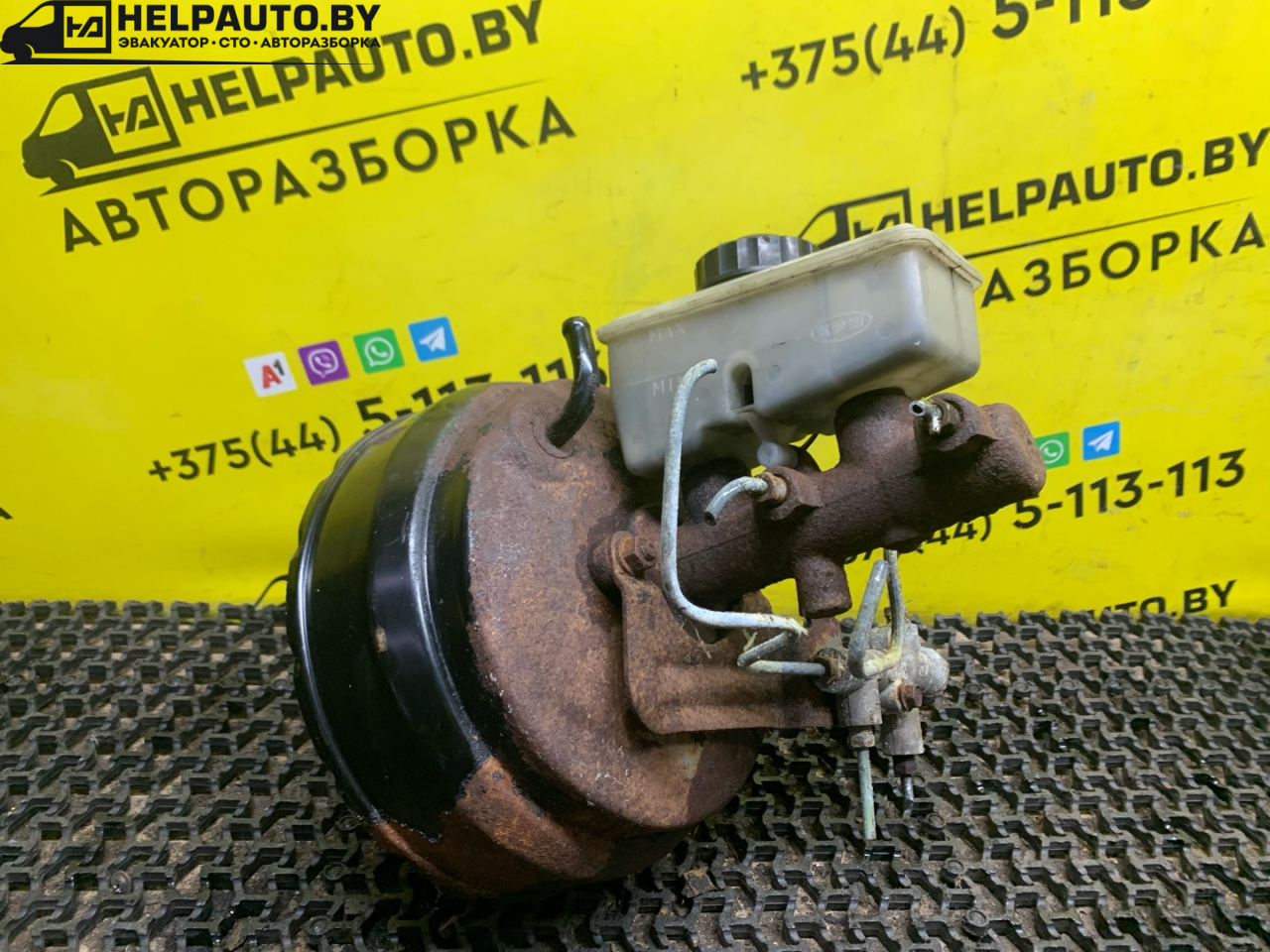 цилиндр тормозной главный Kia Sportage 1 поколение 2000, 2.0 л., FE (16V), бензин, МКПП, зеленый, полный подключаемый привод, правый руль - фото №1