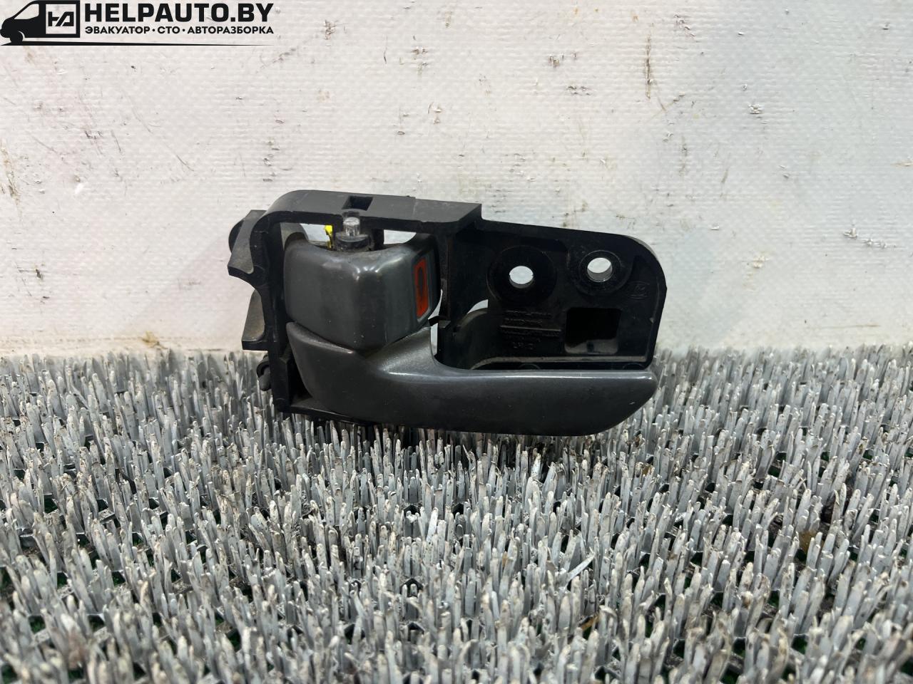 ручка внутренняя передняя левая Toyota Carina E 1 поколение T190 1995, 1.6 л., 4A-FE, бензин, МКПП, зелёный, хетчбэк 5 дв., передний привод, 69205-05010 - фото №1