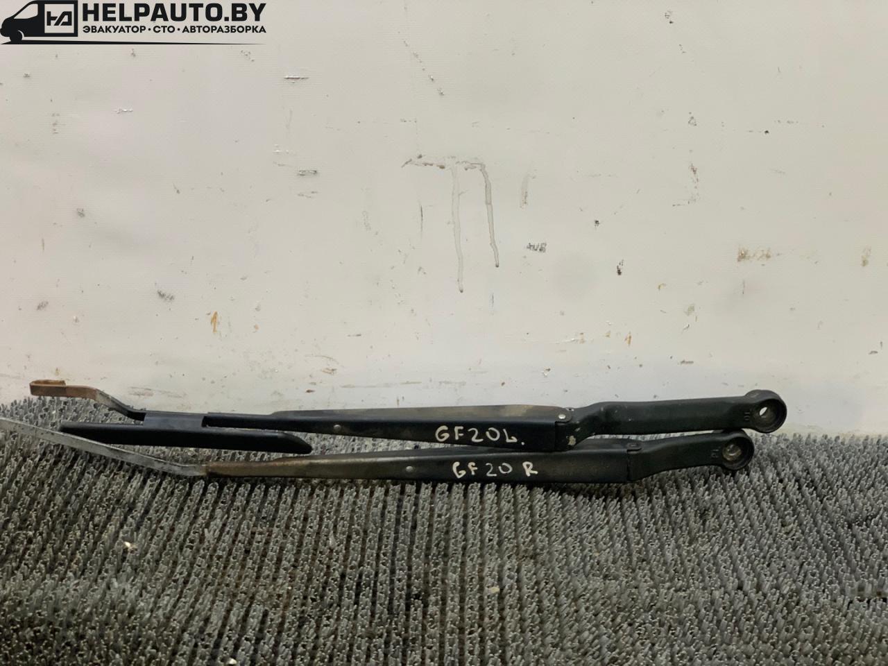 щеткодержатель (поводок стеклоочистителя, дворник) Mazda 626 GF 1997, 2.0 л., дизель, МКПП, зелёный, хетчбэк 5 дв., передний привод - фото №1