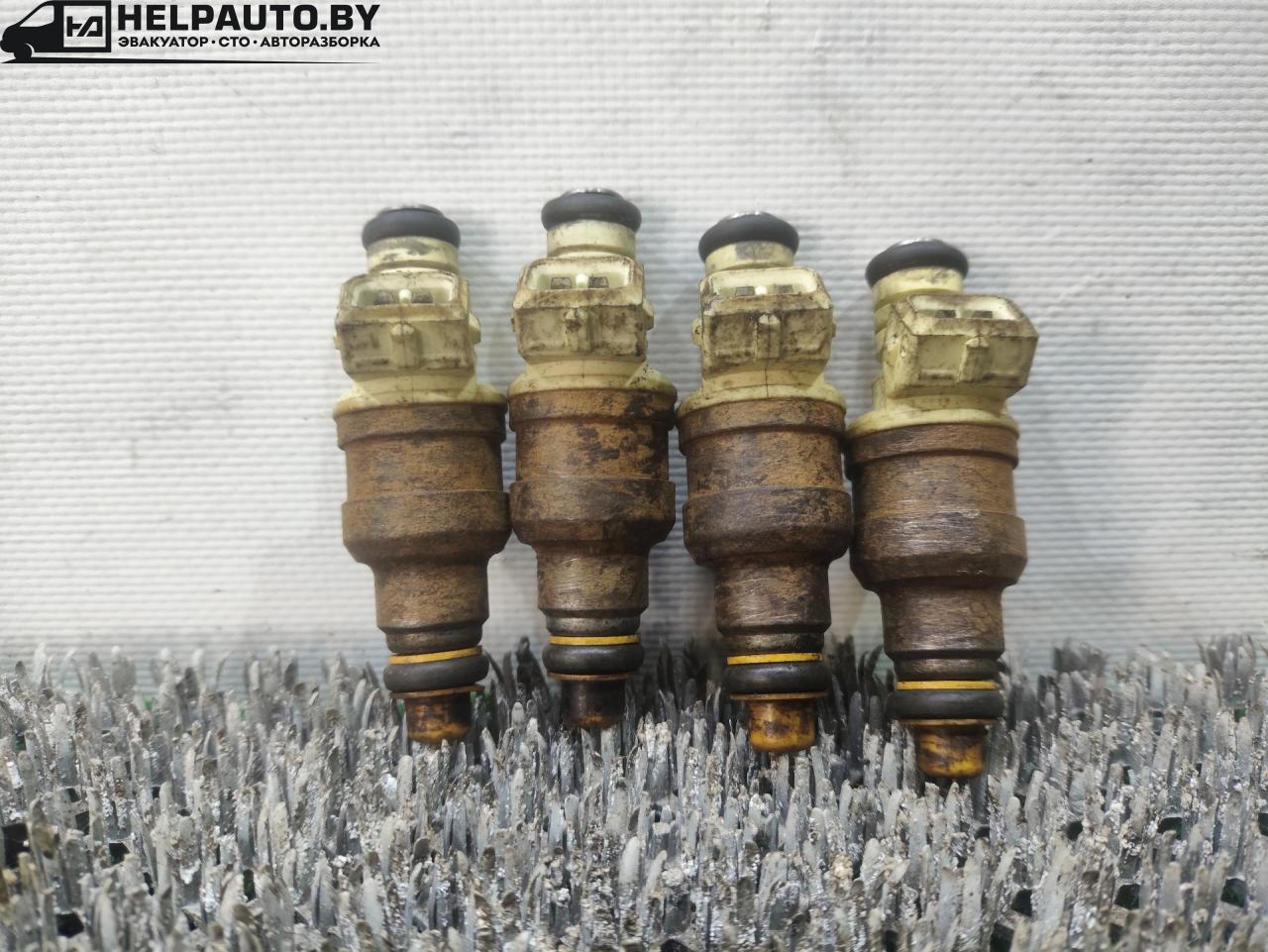 форсунка Volkswagen Golf 2 поколение 1990, 1.3 л., бензин, МКПП, красный, хетчбэк 3 дв., передний привод, 030906031A, 0280150719 - фото №1