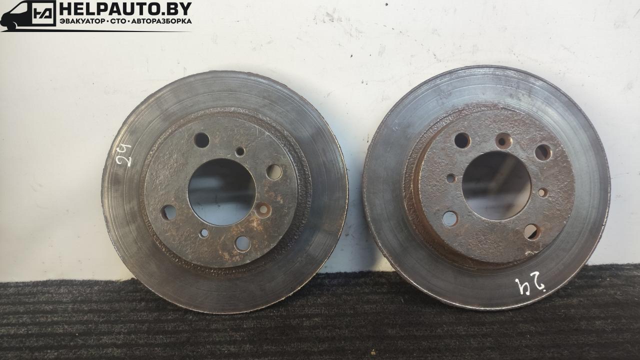 диск тормозной передний Suzuki Baleno 1 поколение 2002, 1.5 л., бензин, МКПП, чёрный, седан - фото №1