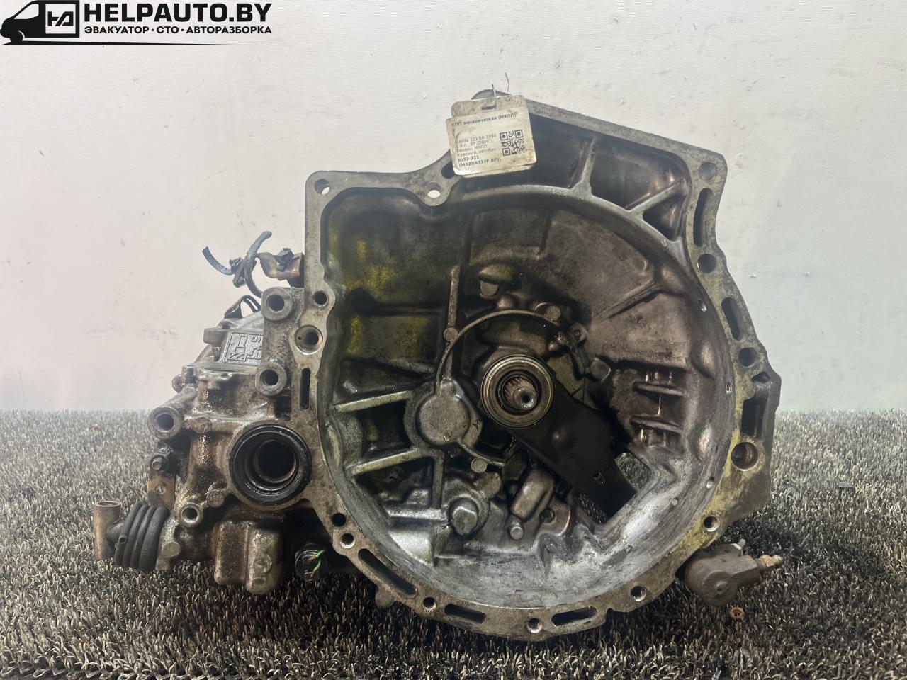 КПП механическая (МКПП) Mazda 323 5 поколение 1994, 1.8 л., BP (DOHC), бензин, МКПП, красный, хетчбэк 5 дв., передний привод, F5D2-3 - фото №1