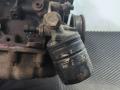 корпус масляного фильтра Suzuki Forenza 1 поколение 2004, 2.0 л., бензин, АКПП, чёрный, седан, передний привод - фото №4