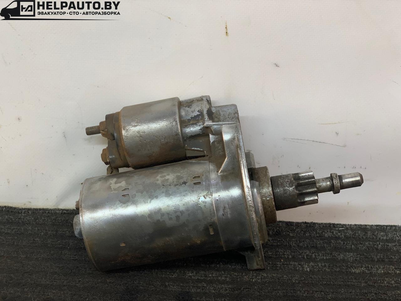 стартер Volkswagen Passat B3 1988, 1.8 л., бензин, МКПП, белый, седан, передний привод, 001112.010, 02A911023 - фото №1