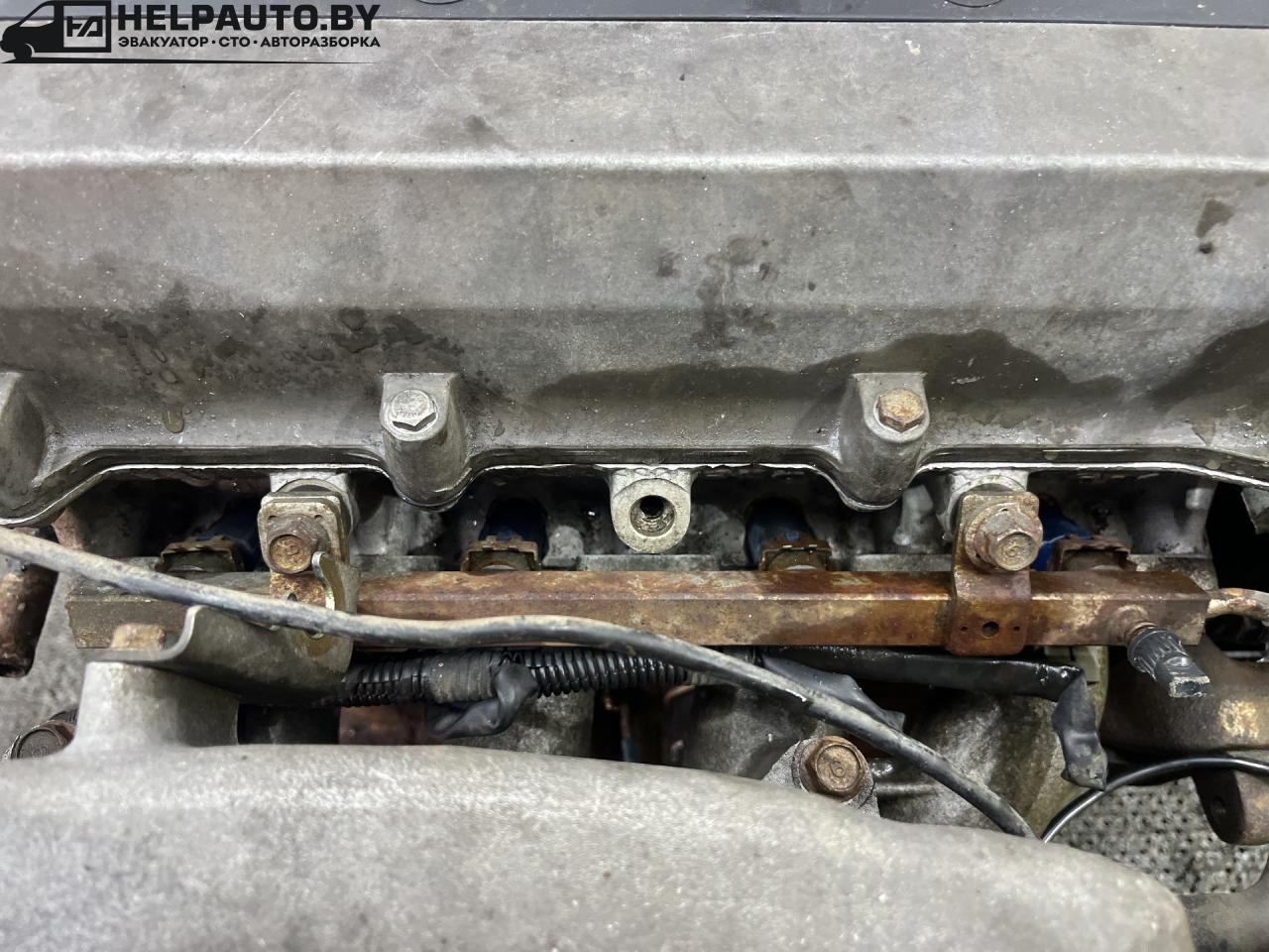 форсунка Kia Shuma 1 поколение 1999, 1.5 л., бензин, МКПП, красный, хетчбэк 5 дв., передний привод - фото №1