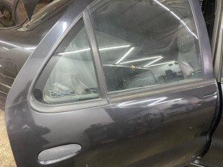 стекло двери задней правой Pontiac Sunfire 1 поколение 1999, 2.2 л., бензин, АКПП, черный, передний привод