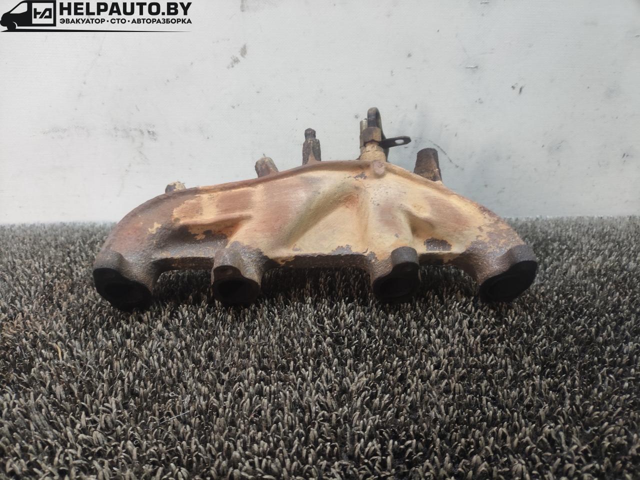 коллектор выпускной Volkswagen Golf 2 поколение 1990, 1.6 л., дизель, МКПП, черный, хетчбэк 3 дв., передний привод - фото №1