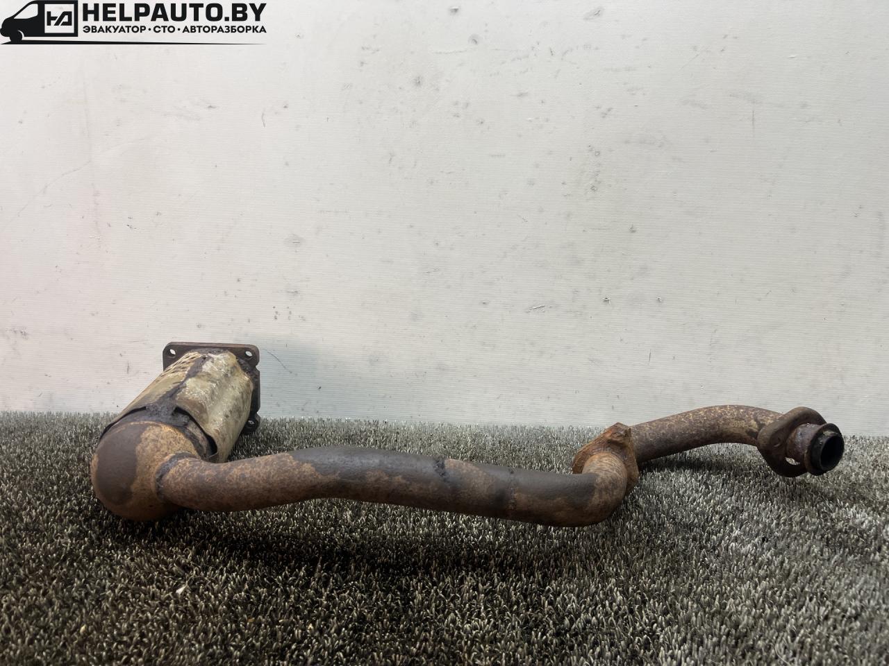 труба приемная глушителя Iran Khodro Samand 1 поколение 2009, 1.6 л., бензин, МКПП, чёрный, седан, передний привод - фото №1